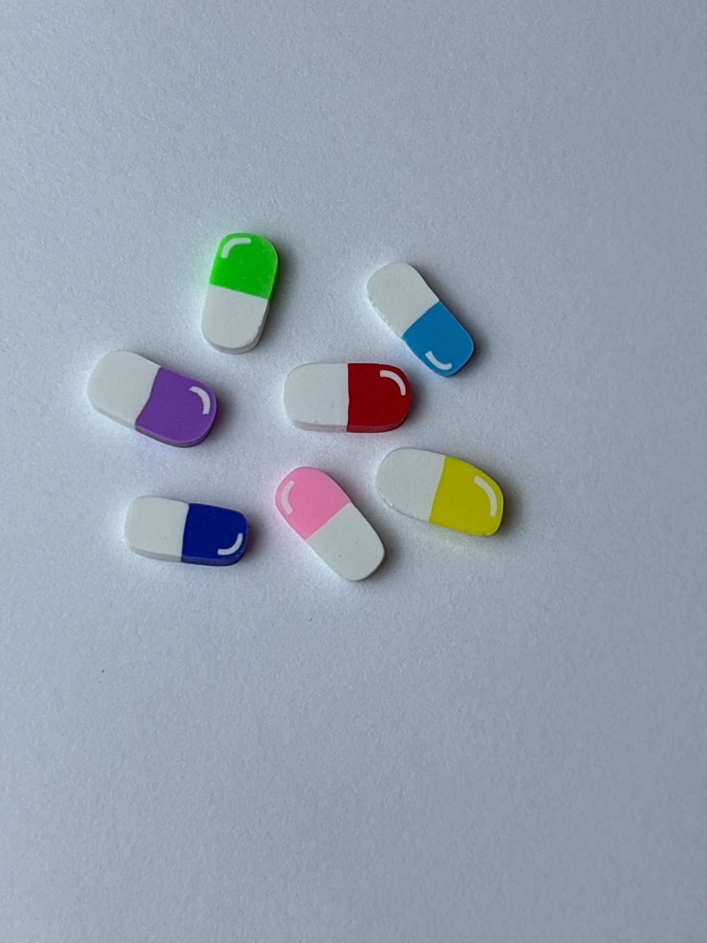 Prescription bottle shaker badge reel