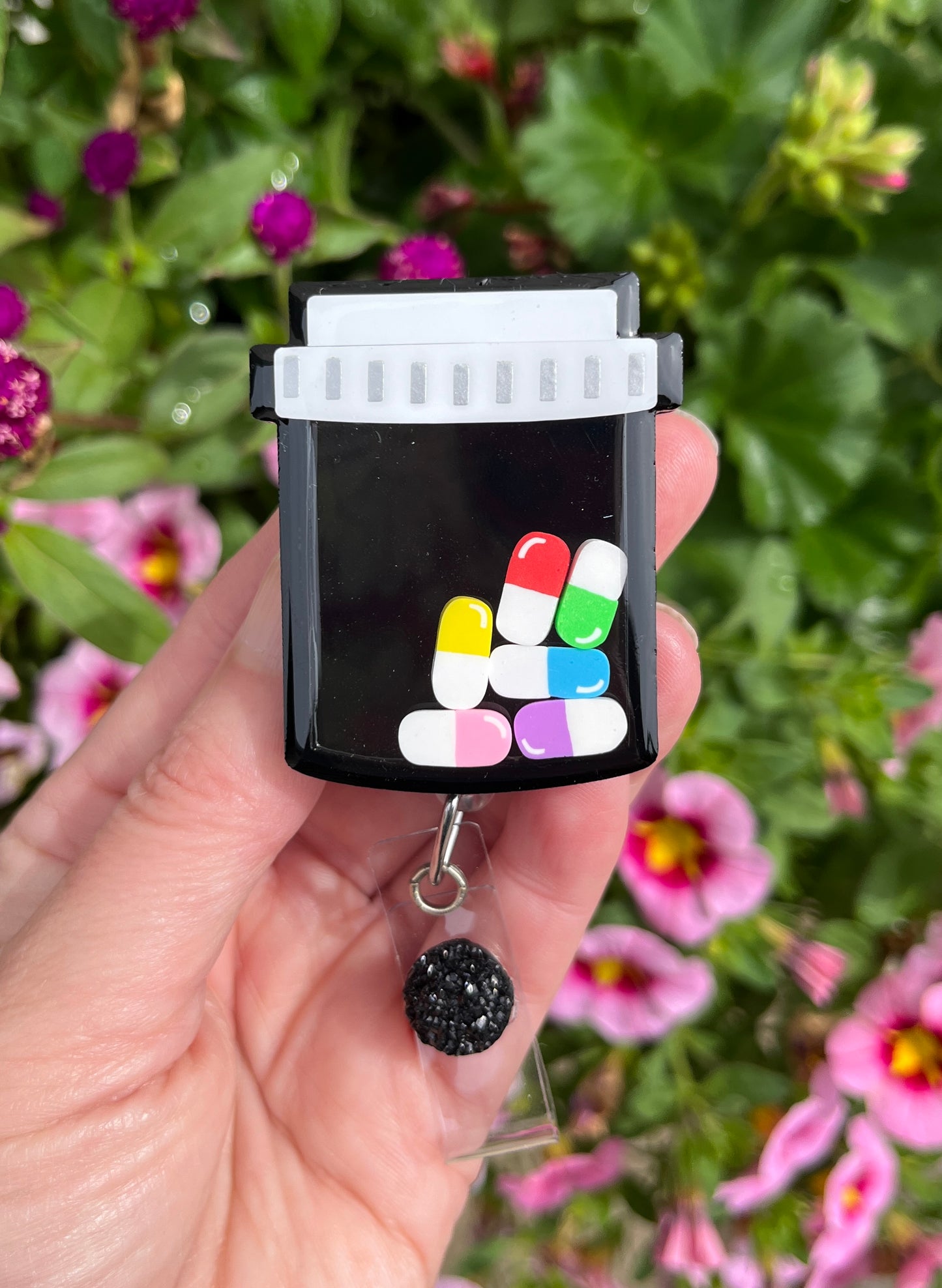 Prescription bottle shaker badge reel, Black w/multi colors