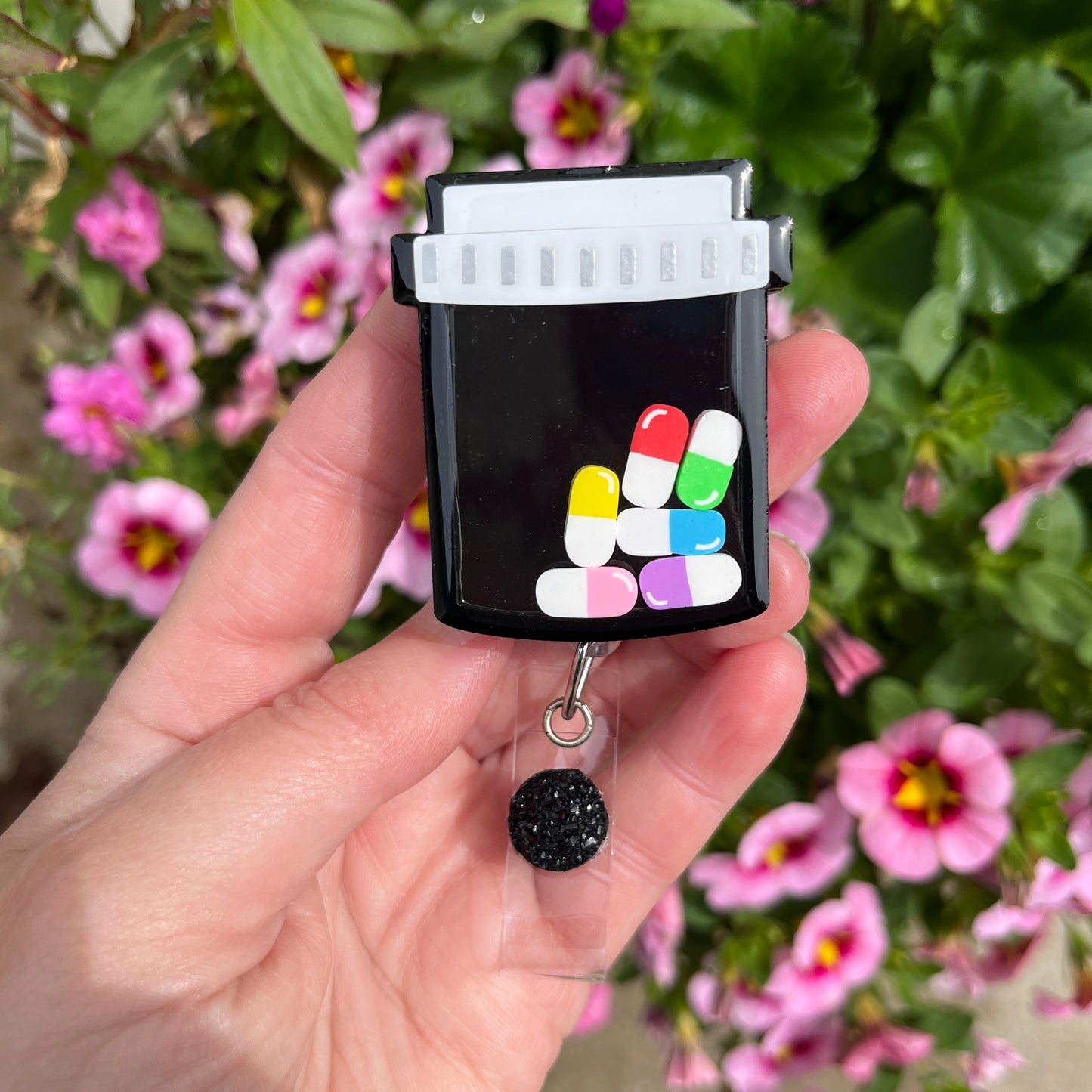 Prescription bottle shaker badge reel, Black w/multi colors