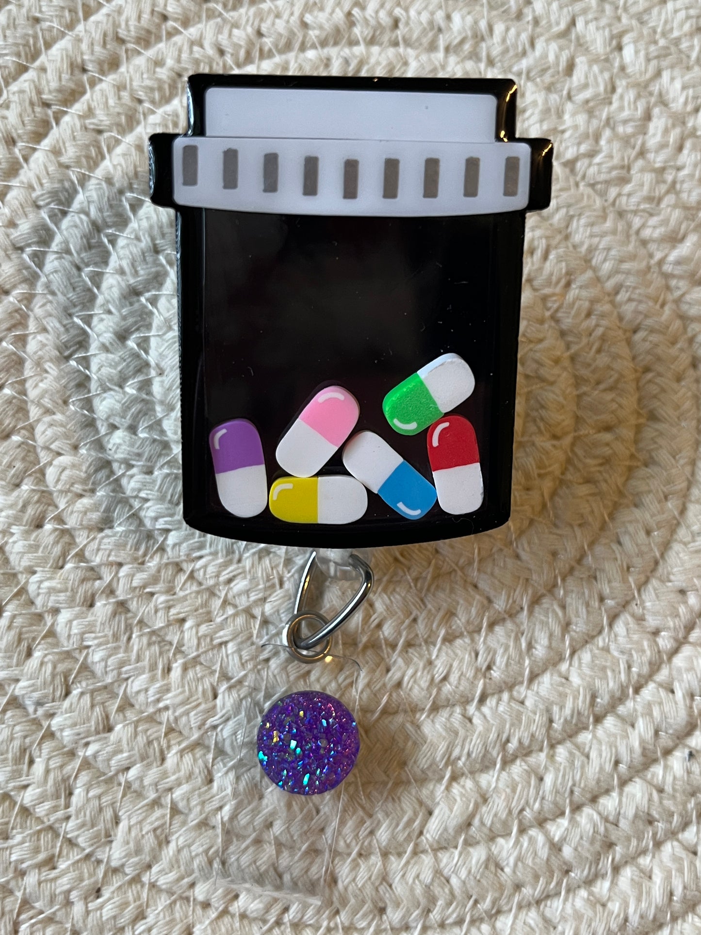 Prescription bottle shaker badge reel, Black w/multi colors